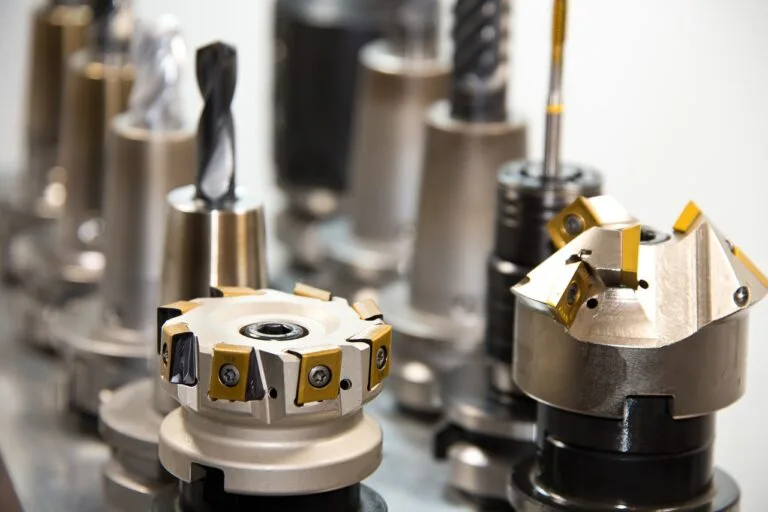 CNC precision machining of forged steel shaft - high tolerance metal finishing and turning